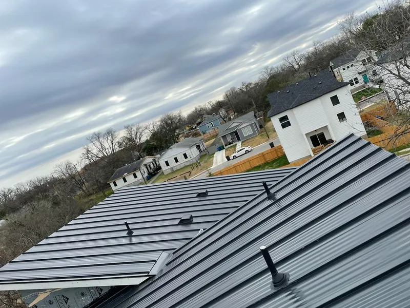 Standing seam metal roof panels with vents for Skylight Repair in Corinth